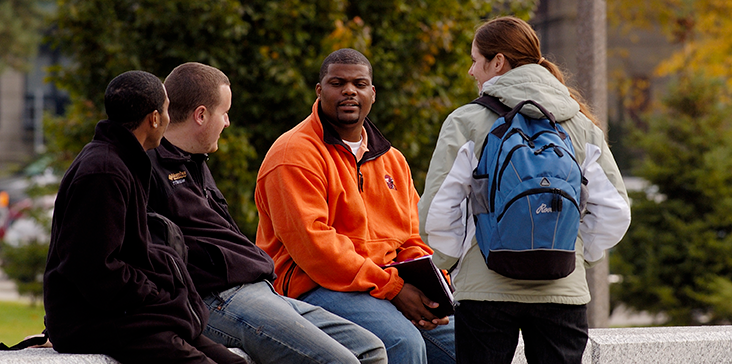 Students talking outside on MSU campus
