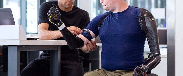 Student working on a mechanical prosthetic