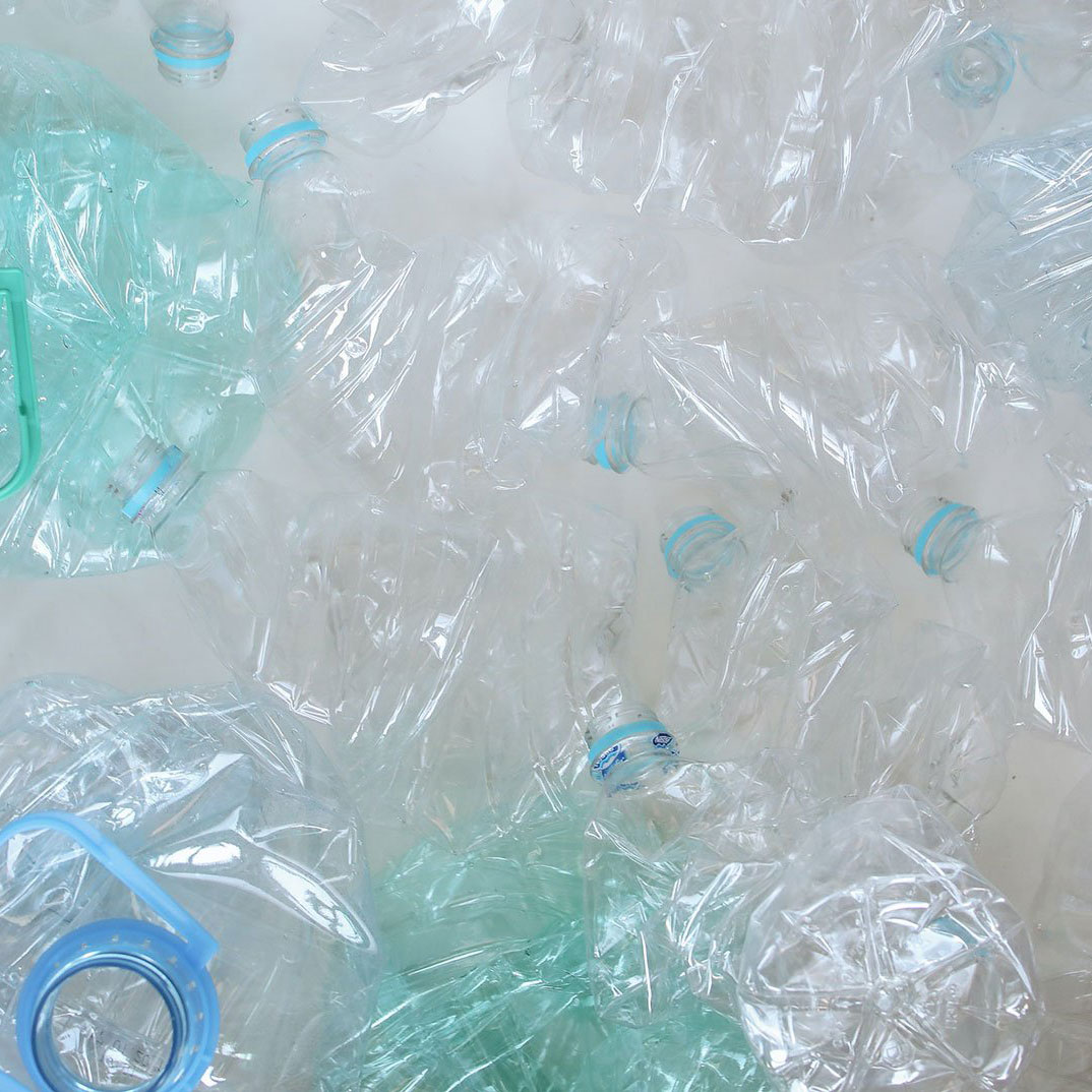 A heap of flattened plastic bottles