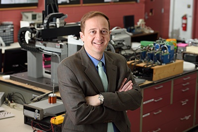 John Papapolymerou in a lab