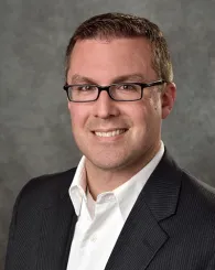 Professional headshot of Timothy Gates